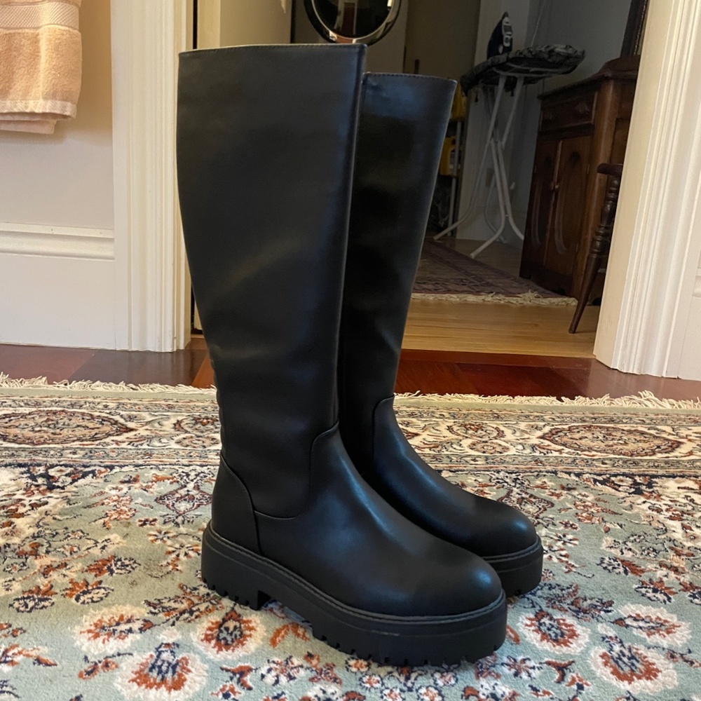 Black knee-high lug boots